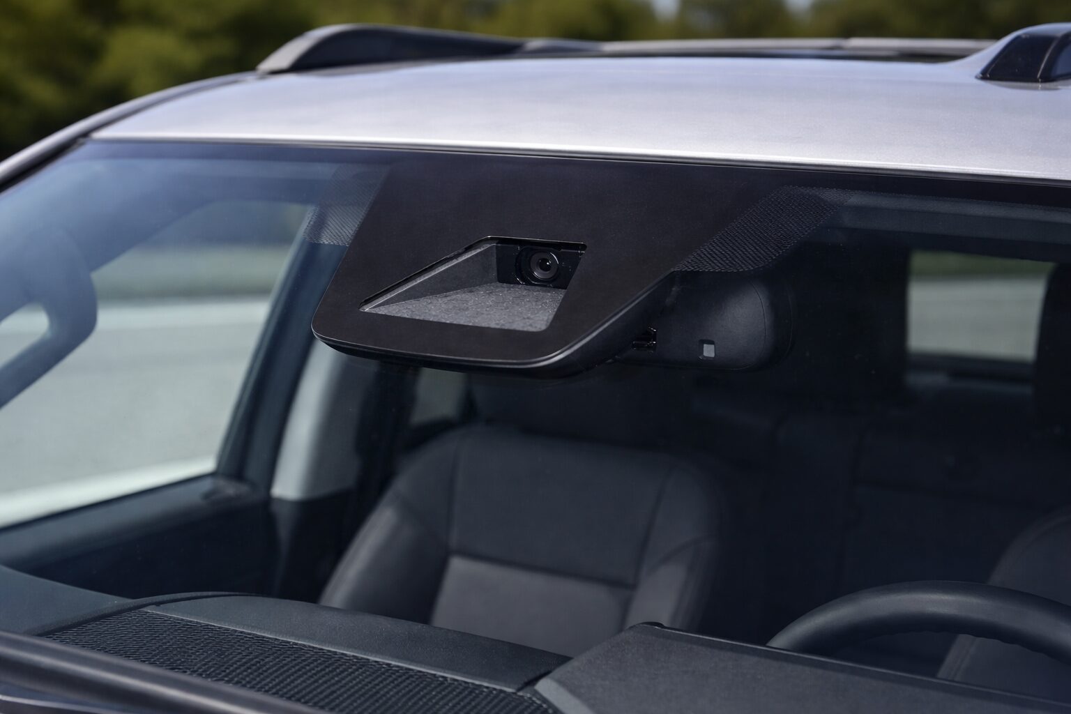 Windshield with foward facing camera for ADAS camera recalibration